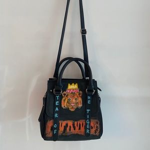 Hand painted by artist vegan leather mini purse.
